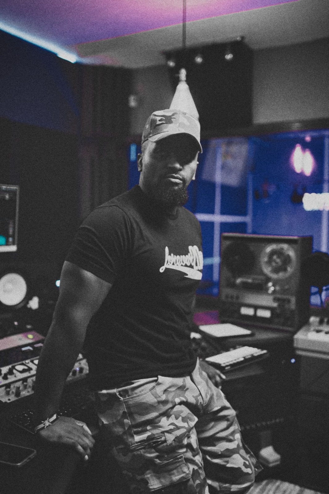 Giggz standing in the Xtrim Studios control room